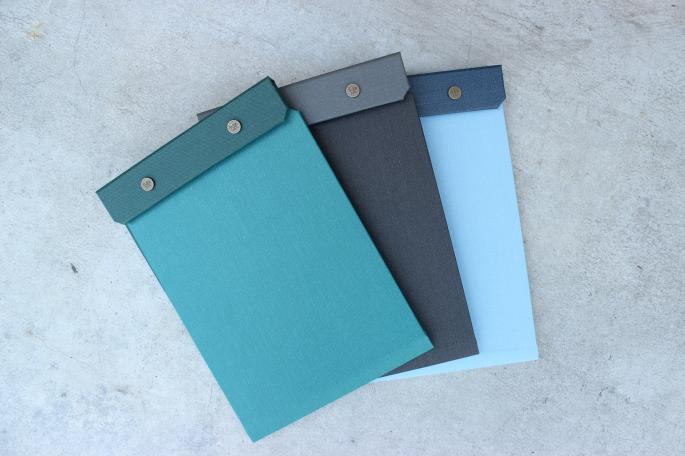 POSTALCO<br />
Snap Pad A5<br />
COLOR / Peacock Green,Faded Black,Ice Blue<br />
Made in JAPAN<br />
PRICE / 3,600+tax<br />
<br />
POSTALCO<br />
Notebook A5<br />
COLOR / Apple Green,Dark Blue ,Signal Red <br />
Made in JAPAN<br />
PRICE / 1,900+tax<br />
<br />
CARAN d´ACHE<br />
Ballpoint pen (849 Collection)<br />
COLOR / White,Red,Blue,Black<br />
Made in SWITZERAND <br />
PRICE / 2,800+tax <br />
<br />
